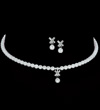 Cross crystal and pearl necklace set